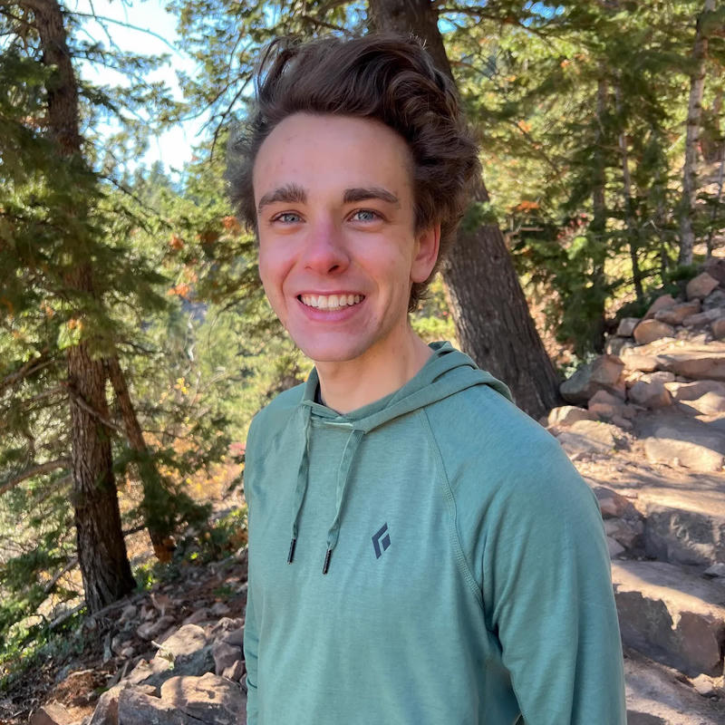 The author, Jeremiah, on a trail in the mountains.