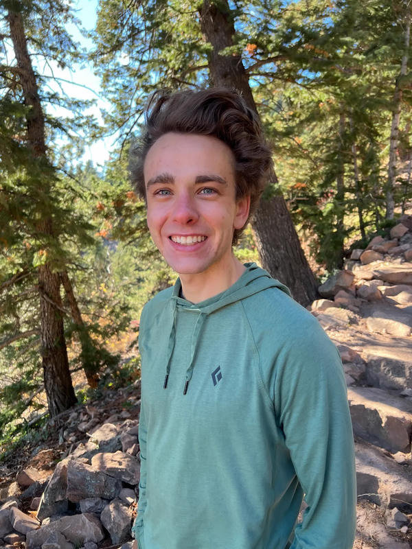 The author, Jeremiah, on a trail in the mountains.